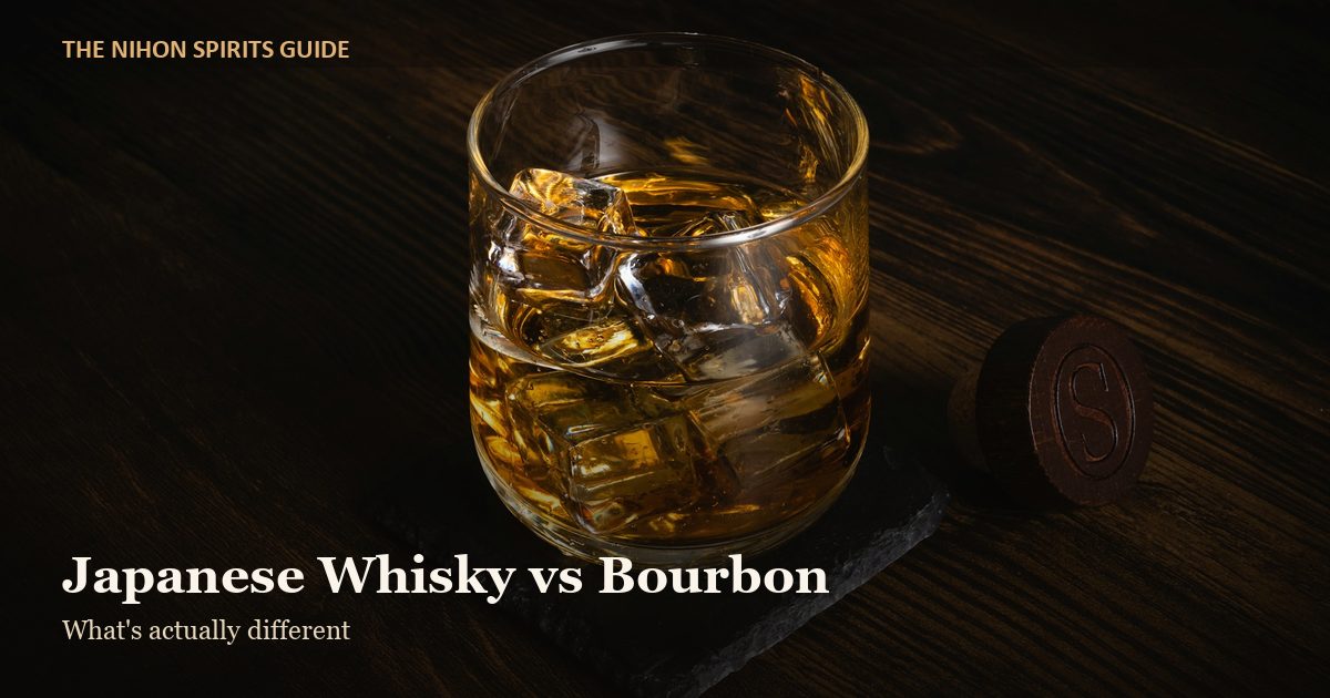 japanese whisky vs bourbon - whisky glass with ice on a wooden table