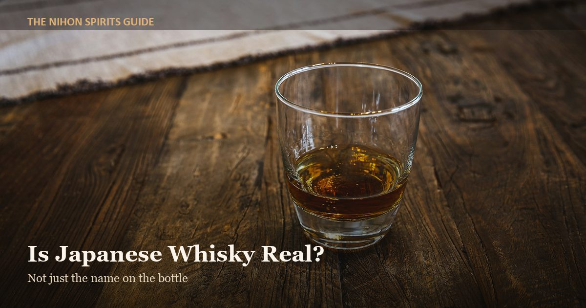 is japanese whisky real - whisky glass on a wooden table
